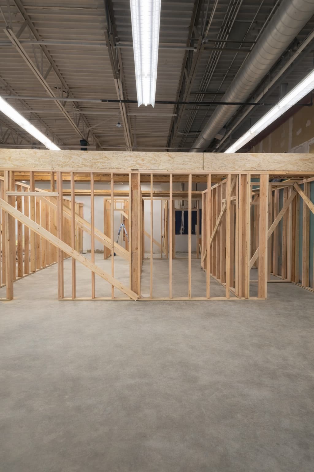 Tight-tolerance interior framing layout staged before drywall — the discipline of good framing shows up in the finish.
